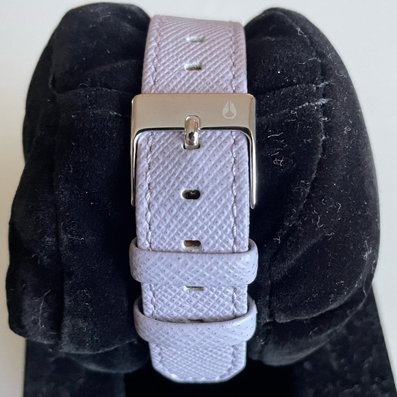 Nixon women’s Kensington watch with a lavender leather band. Brand new with box.